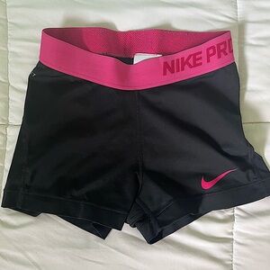 Black with Pink Nike Pros Size XS - great condition!